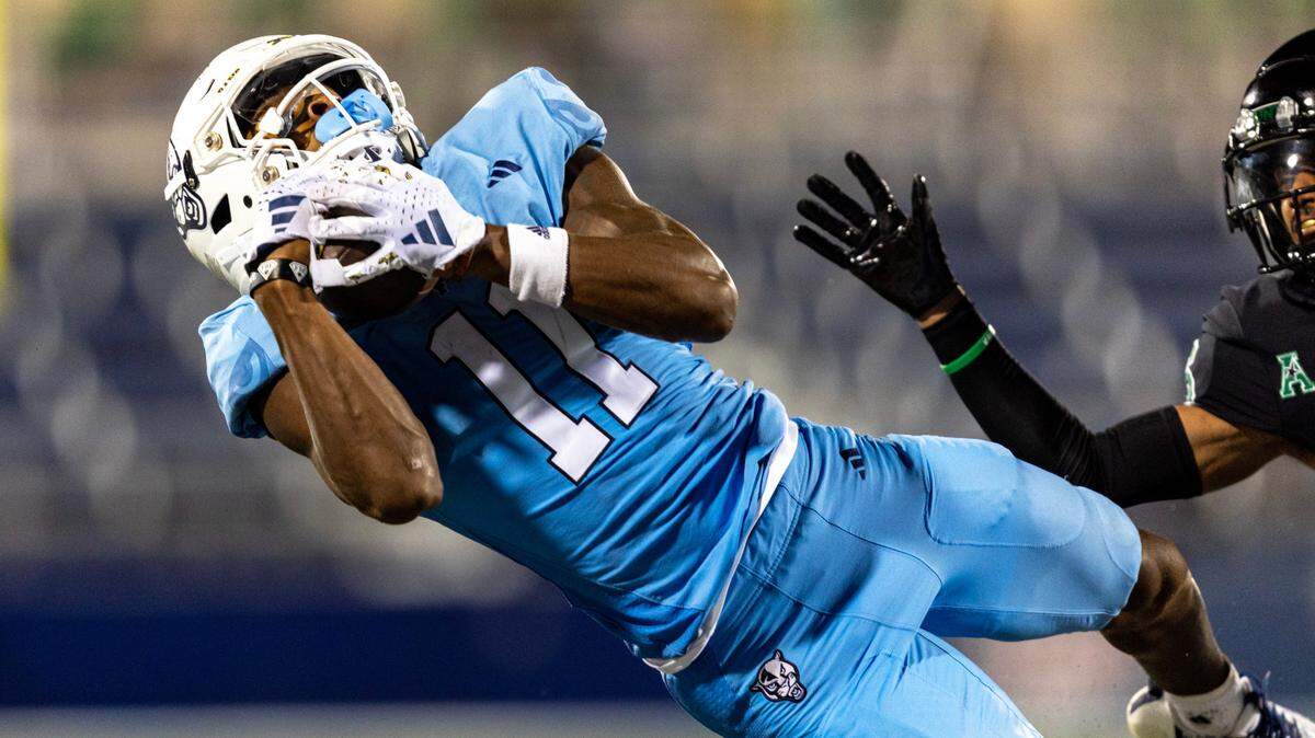 Florida International University wide receiver Dean Patterson (11) makes the reception along the sideline during the second half of a college football game against North Texas at Riccardo Silva Stadium in Miami, Florida, on Saturday, September 9, 2023.