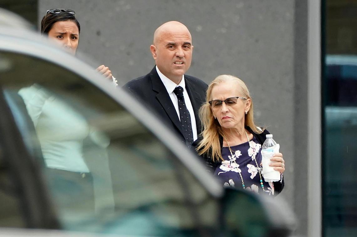 Former DEA agent Jose Irizarry, center, arrives at the United States Courthouse last November. The once standout DEA agent used his badge to build a lavish lifestyle of expensive cars, parties on yachts and Tiffany jewels while helping out the same Colombian money launderers he was supposed to be combatting. He pleaded guilty in 2020 to 19 corruption counts, including money laundering and bank fraud.