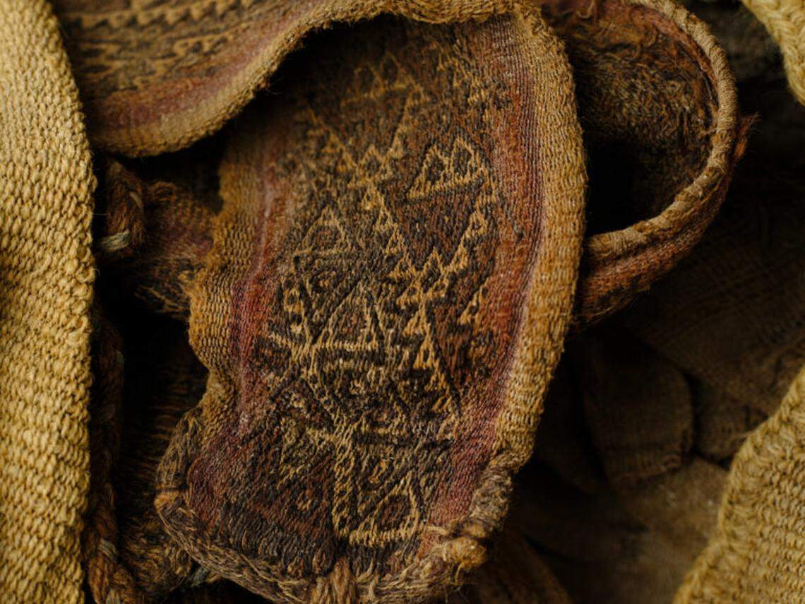 Decorative fabric adorning one of the mummies.