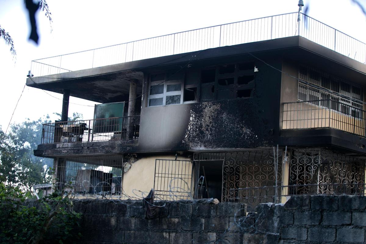 The Orphanage of the Church of Bible Understanding stands with blackened walls the morning after a fire broke out in Kenscoff, on the outskirts of Port-au-Prince, Haiti, Friday, Feb. 14, 2020, killing 15 children, according to healthcare workers.