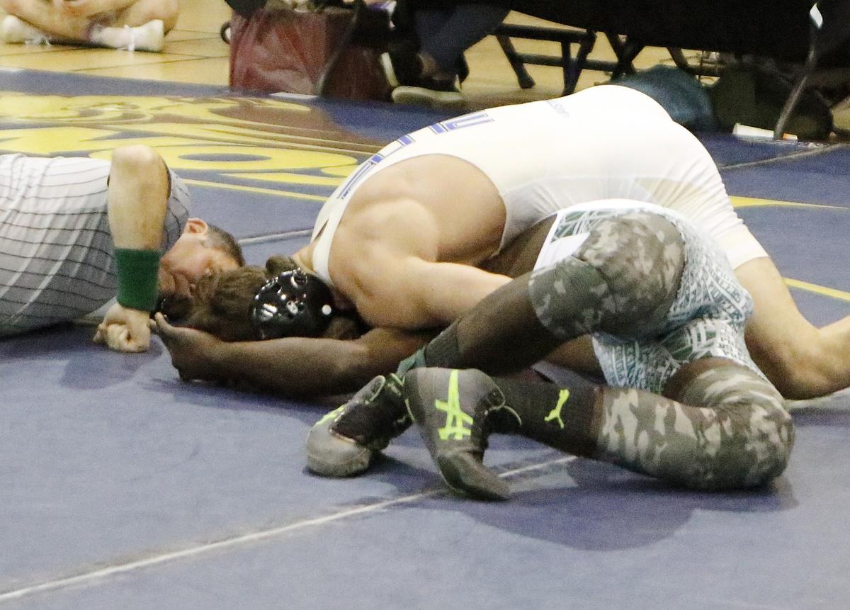 It took 36 sec for Brevin Balmeceda of South Dade to win a match against North Miami’s Rivaldo Valmy during Region 4-3A 160 lbs class HS wrestling finals on March 2, 2019 at Ronald W. Reagan Doral Senior HS in Doral