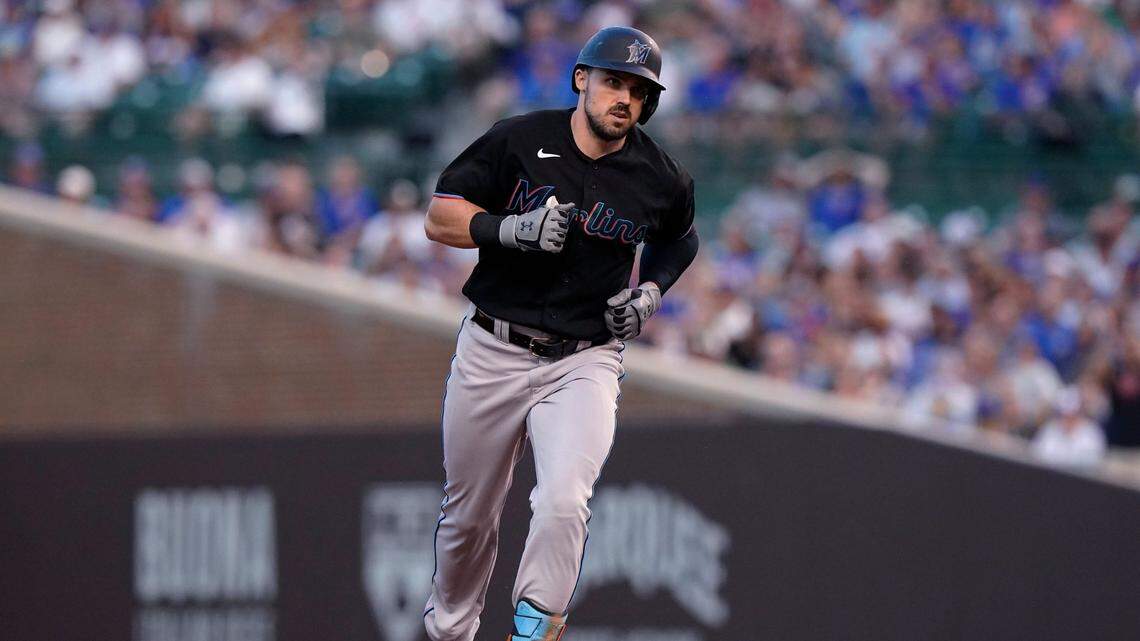 Miami Marlins’ Adam Duvall runs the bases after hitting a grand slam during the third inning of the team’s baseball game against the Chicago Cubs in Chicago, Friday, June 18, 2021.
