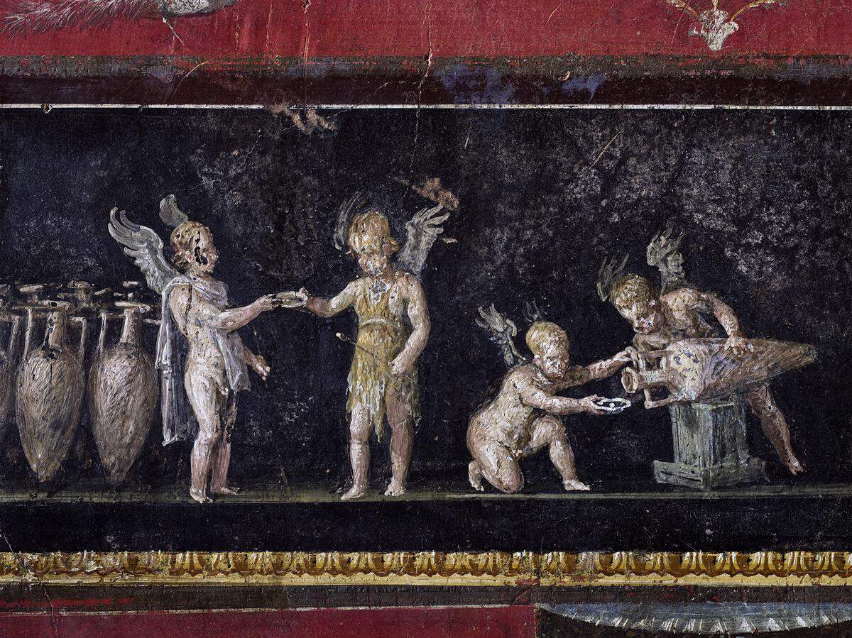 Restored wall painting in the room of the cupids.