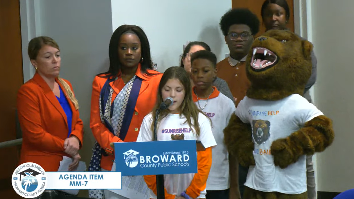 Elizabeth, a sixth grader at Bair Middle School, speaks at the Jan. 21 Broward County School Board meeting to ask the school board to not close her school.
