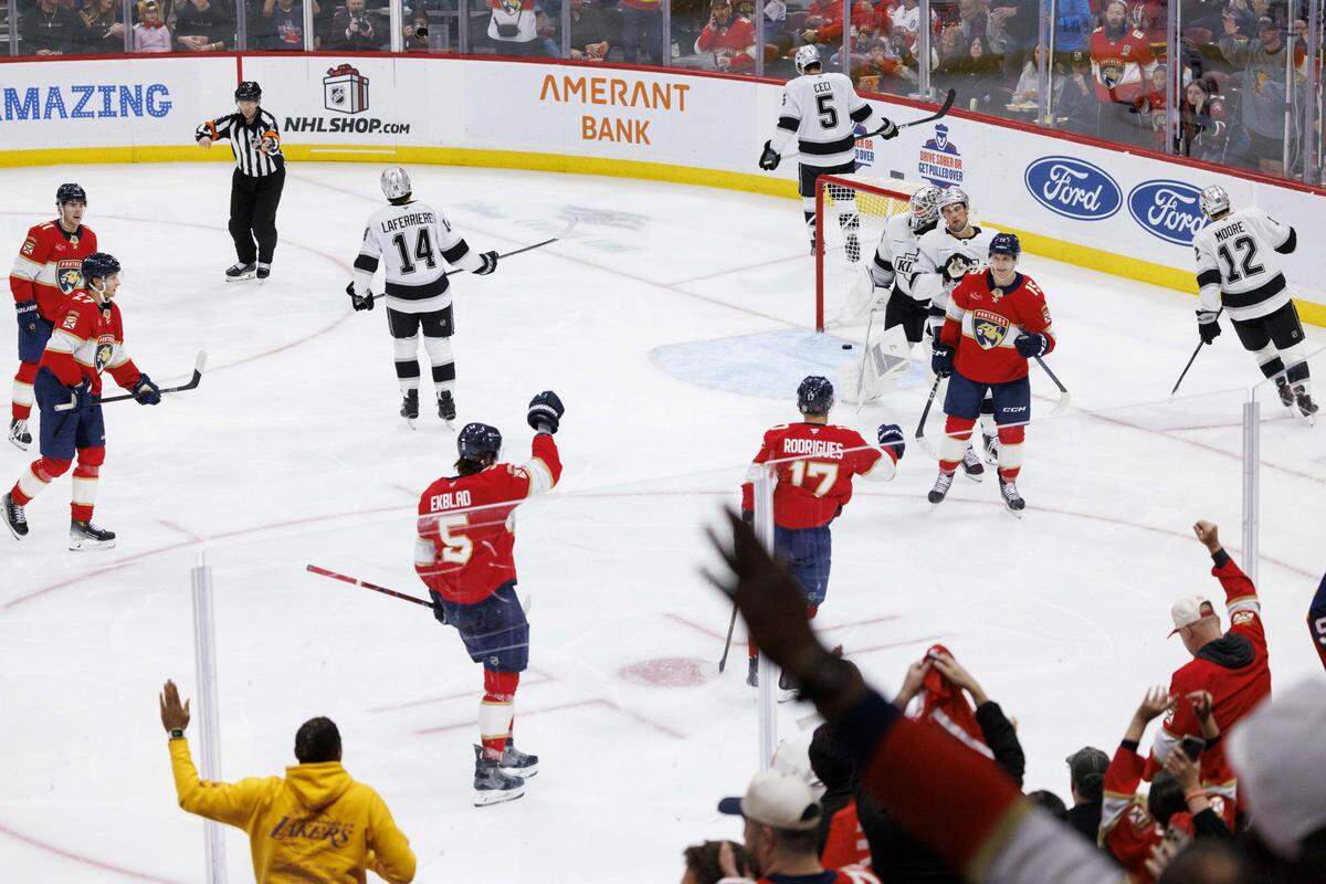 Florida Panthers center Anton Lundell (15) and teammate react to his goal during the second period of a game against the Los Angeles Kings on Wednesday, Dec. 17, 2025, at Amerant Bank Arena in Sunrise, Fla. 