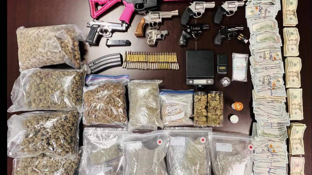 On Friday, Miami-Dade police announced that investigators had found guns, ammunition, narcotics and more than $55,000 during a federal raid Thursday that left a man dead.