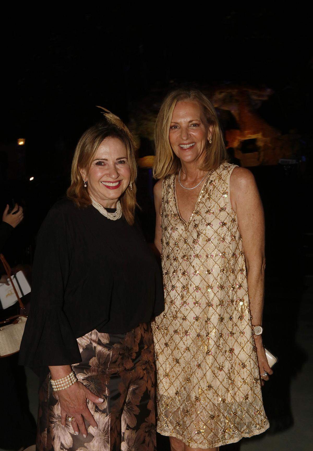 Martha Pantin, left, and Lisa Petrillo, right, attend an event at the soon-to-reopen Venetian Pool on Sunday, Dec. 7, 2025, in Coral Gables, Florida.