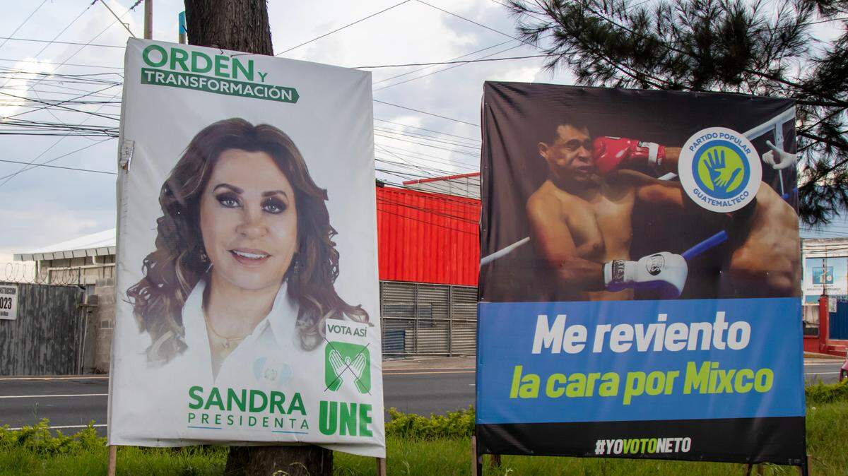 Election posters in Guatemala on June 16 show Sandra Torres, presidential candidate of the Unidad Nacional de la Esperanza party, UNE, and Neto Bran, mayoral candidate of the municipality of Míxco of the Partido Popular Guatemalteco party. 