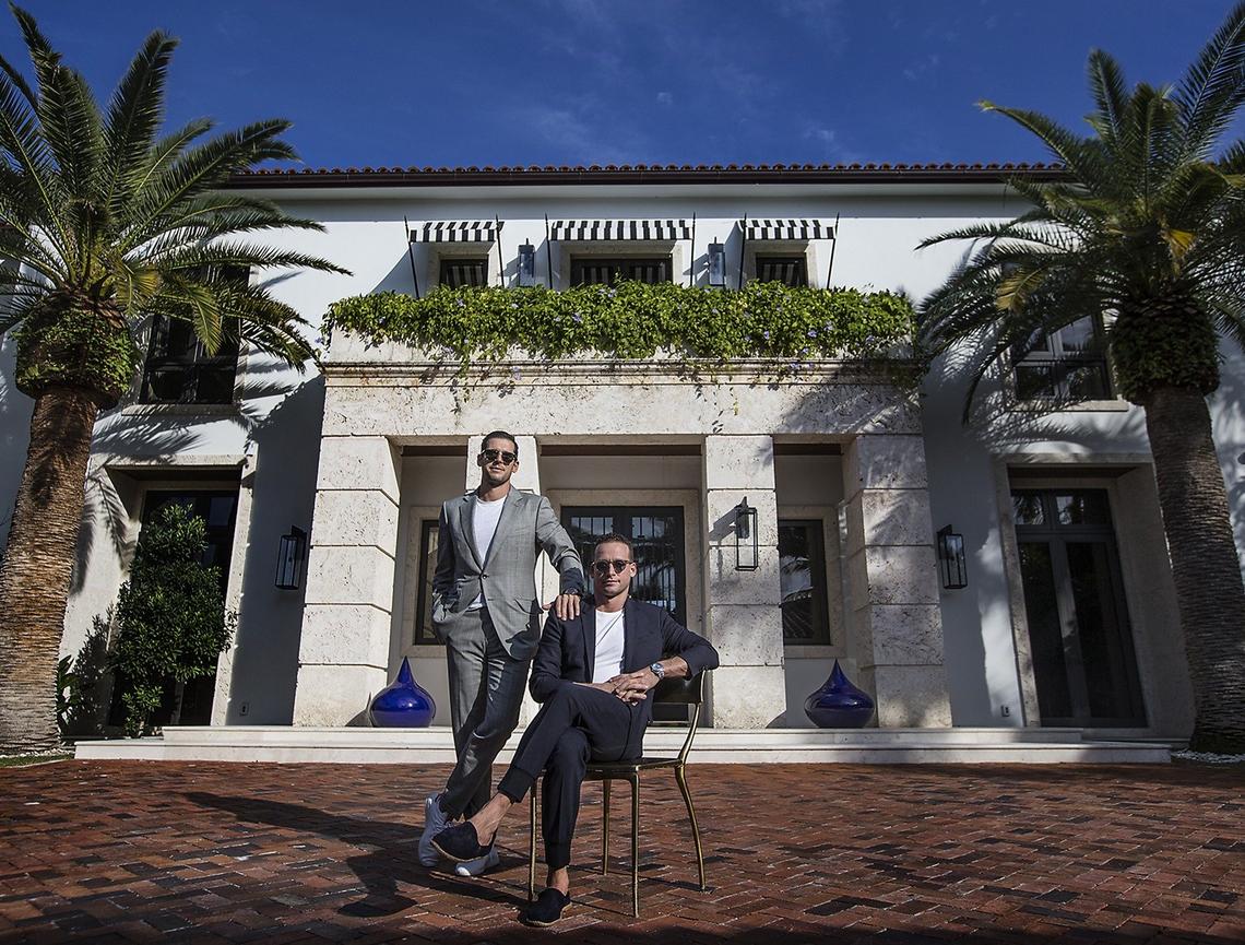 Real estate brokers Tal (right) and Oren Alexander outside their home in Miami Beach on Friday, February 1, 2019.