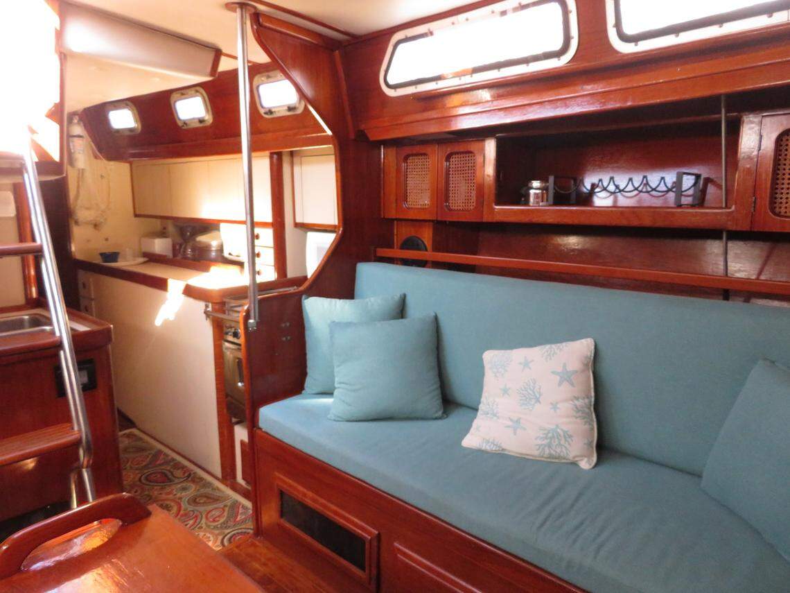The upholstery and cushions in the living room had to be replaced by the Key West couple who now owns the sailboat.