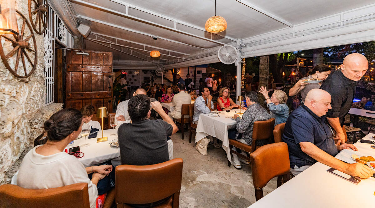 Diners at the Mediterranean Eos Garden in Miami.