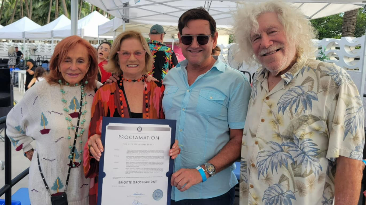 Miami Beach mayoral candidate Michael Gongora (second from right) presented a proclamation at the Miami Beach Bandshell in June 2023 on behalf of City Commissioner Kristen Rosen Gonzalez. After Mayor Dan Gelber flagged the practice, Miami-Dade Commission on Ethics and Public Trust executive director Jose Arrojo said it “creates an appearance of impropriety.”