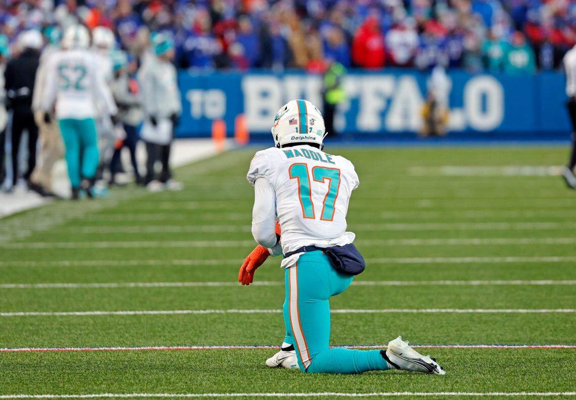Miami Dolphins wide receiver Jaylen Waddle (17) takes a knee after an incomplete pass in the fourth quarter against the Buffalo Bills of the NFL wild-card football game at Highmark Stadium, Orchard Park, NY, on Sunday, January 15, 2023.