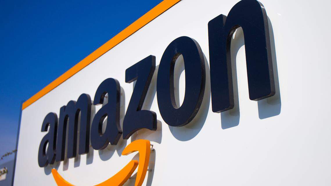 A former Amazon manager in Georgia stole nearly $10 million from the company and was sentenced to prison, prosecutors said.