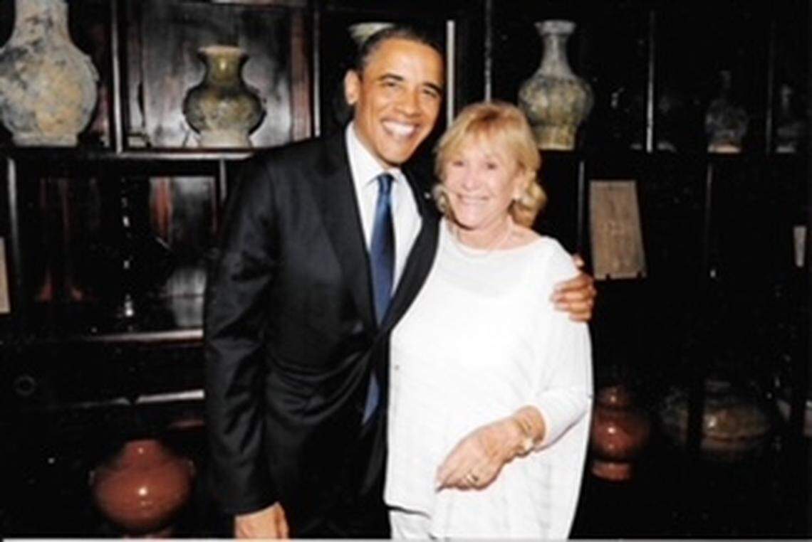 Phyllis Apple with President Barack Obama in a family photo. Apple was an avid Democrat, her children remember, and meeting Obama meant a lot to her.
