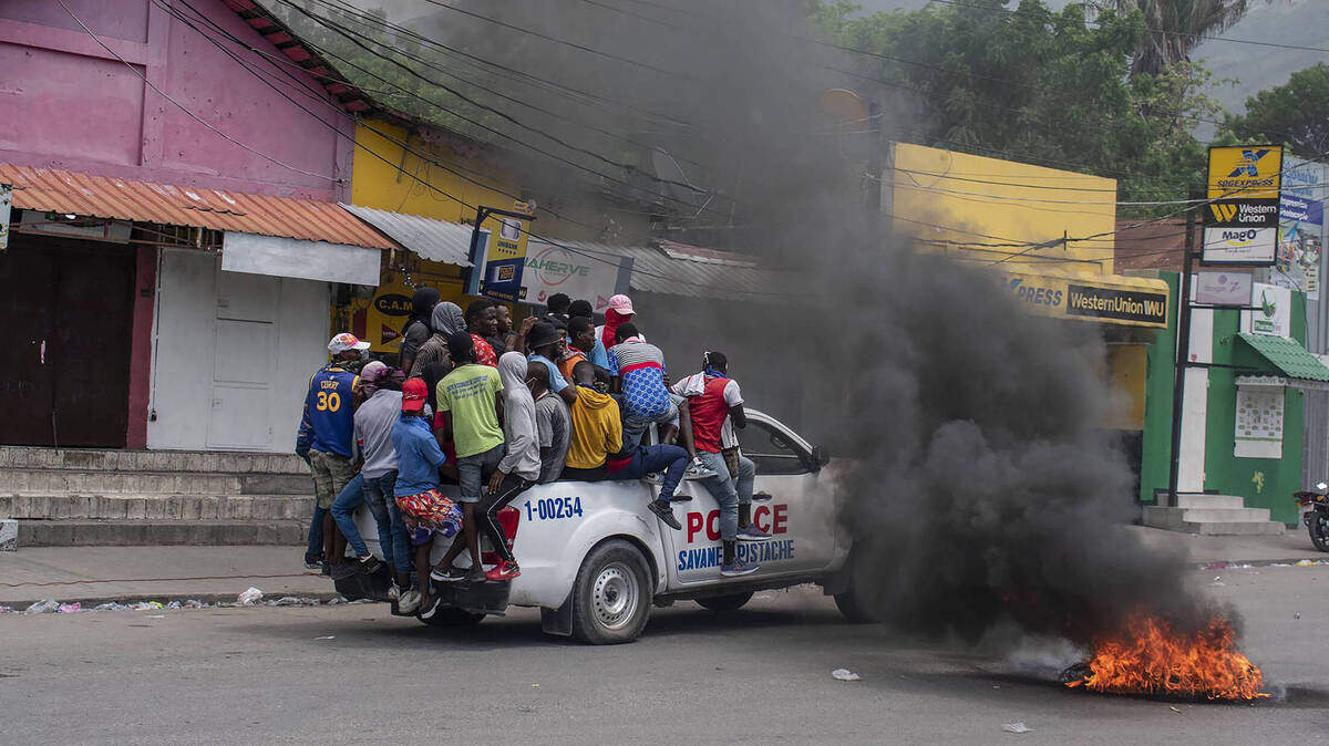 The population took a police car with a few police officers to go and reinforce their area. The residents of Carrefour-Feuilles were in the streets to denounce gang violence and ask the government to take all measures to curb their abuses and the police dispersed them with tear gas in Port-au-Prince, Florida, on Aug. 14 2023.