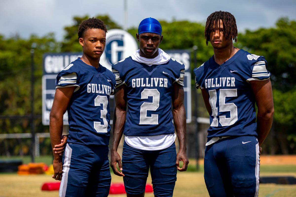 Gulliver Prep varsity football wide receiver Jalen Brown (3), defensive back Daniel Harris (2), and Lamont Green Jr. (45) during practice at Gulliver Middle School in Pinecrest, Florida, on Wednesday, August 10, 2022.