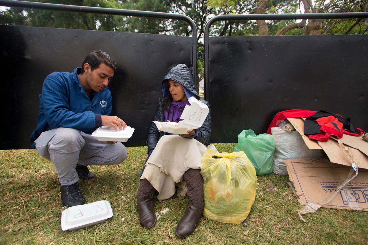Francely Ramirez and her husband, both Venezuelan migrants, have been living outside of a squatters camp, also set up by Venezuelan migrants, near the bus station in Bogotá, Colombia.