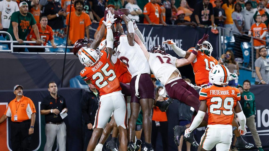 The game ended with a Virginia Tech Hail Mary attempt that was initially ruled a 30-yard, game-winning, walk-off touchdown pass from Virginia Tech Hokies quarterback Kyron Drones (1) to wide receiver Da’Quan Felton (9) but the call was overturned after a lengthy review at the ACC conference football game at Hard Rock Stadium on Friday, September 27, 2024, in Miami Gardens, Fla.