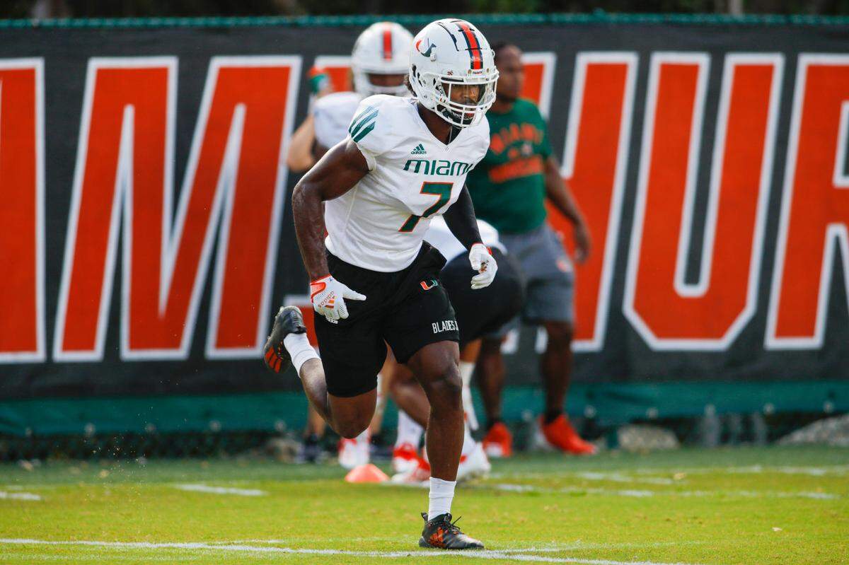 Miami Hurricanes cornerback Al Blades Jr. (7) runs on the field during football practice at the University of Miami campus in Coral Gables, Florida, Tuesday, August 23, 2022.