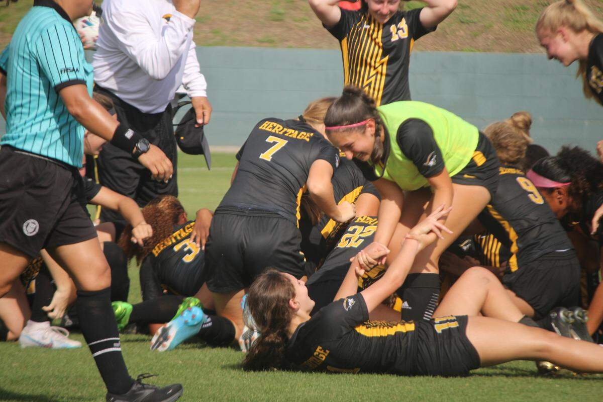 American Heritage’s girls’ soccer team celebrates its first state championship since 2019 and the 12th all-time for its program after beating Cape Coral Mariner in penalty kicks on Friday afternoon at Spec Martin Stadium in DeLand.