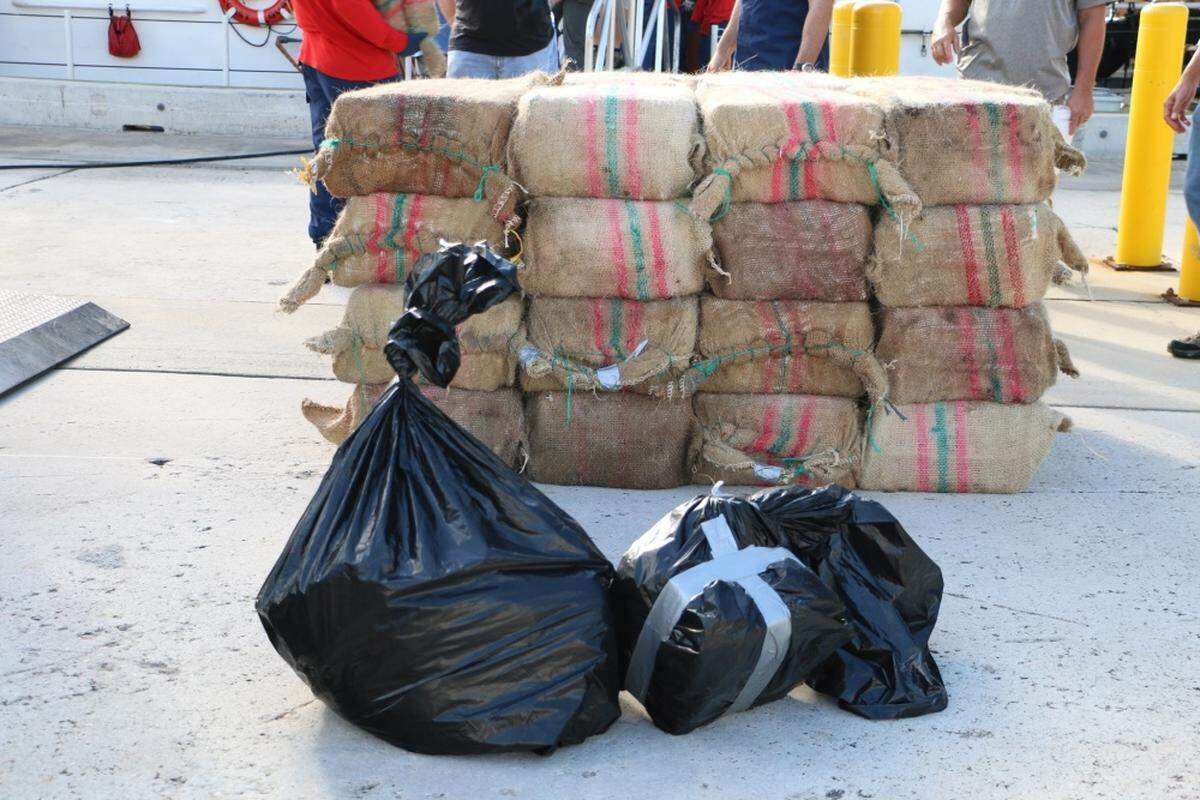 Bales of cocaine lie at Coast Guard Base Miami Beach, Oct. 16, 2018. The crew of the Coast Guard Cutter Bernard C. Webber offloaded approximately 3,516 pounds of cocaine and 50 pounds of marijuana worth an estimated wholesale value of over $47 million.The Coast Guard seized the drugs in international waters off the Caribbean Basin from late September to early October.