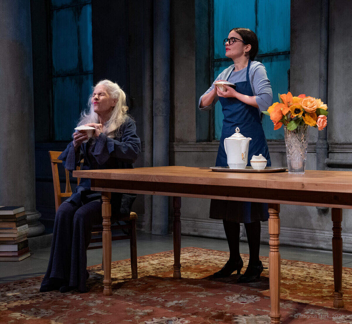 Sara Morsey as Bernadette Kahn and Claudia Tomas as Lucila Pulpo share a cup of tea in a scene from “Sotto Voce” on stage at GableStage through Sunday, Feb. 15.