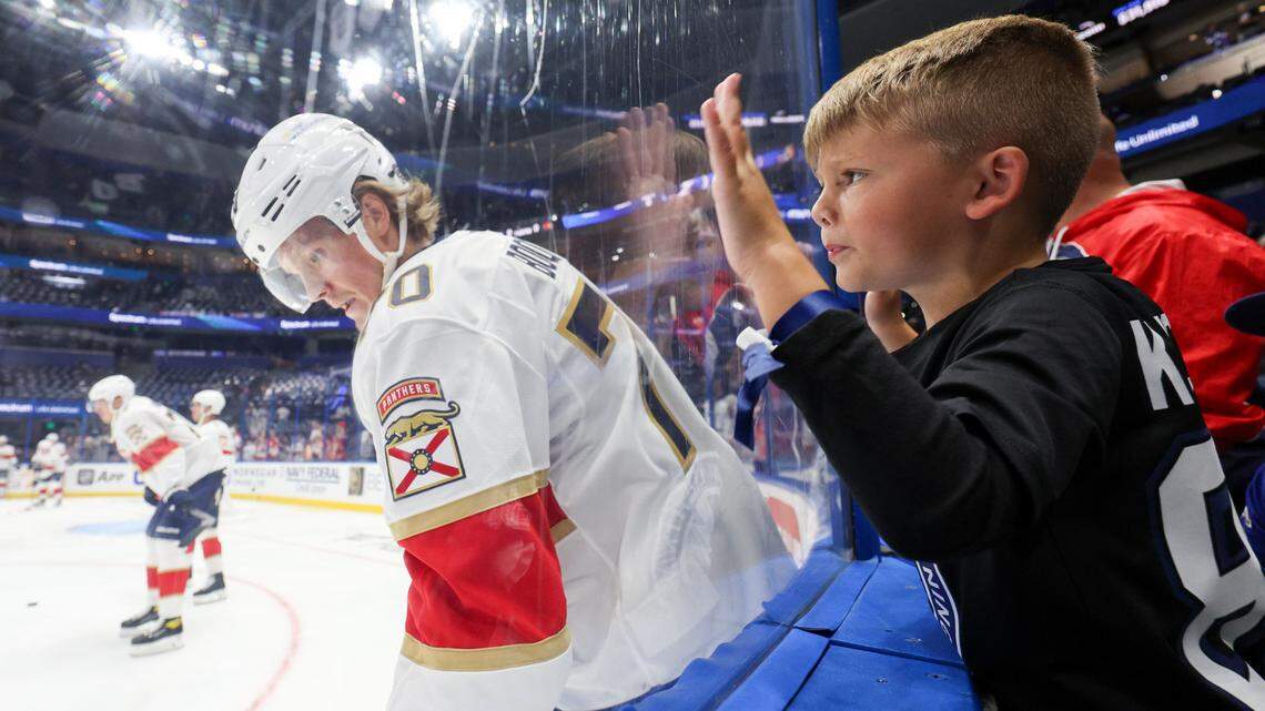 Apr 24, 2025; Tampa, Florida, USA; fans watch Florida Panthers center Jesper Boqvist (70) warm up before game two of the first round of the 2025 Stanley Cup Playoffs against the Tampa Bay Lightning at Amalie Arena. Mandatory Credit: Nathan Ray Seebeck-Imagn Images