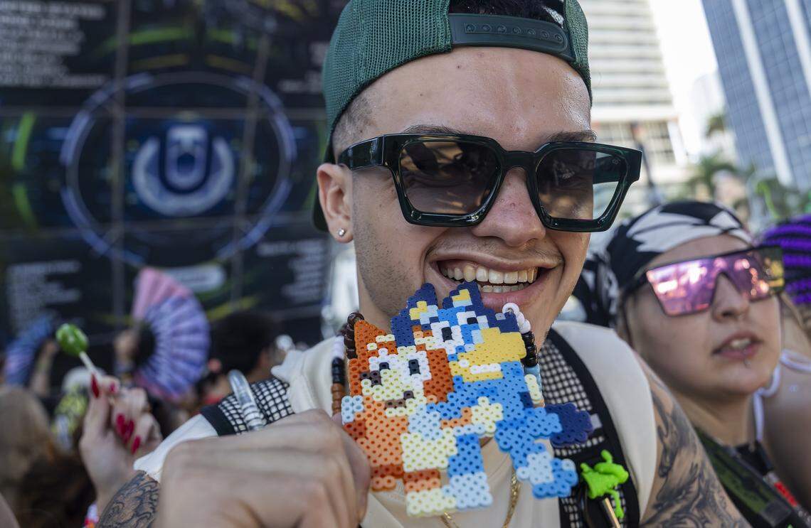 Randy Reynoso, 21, from New Jersey, holds a Bluey themed kandi, as Armnhmr performs during Ultra Music Festival’s 26th anniversary at Bayfront Park on Saturday, March 28, 2026, in downtown Miami, Fla.