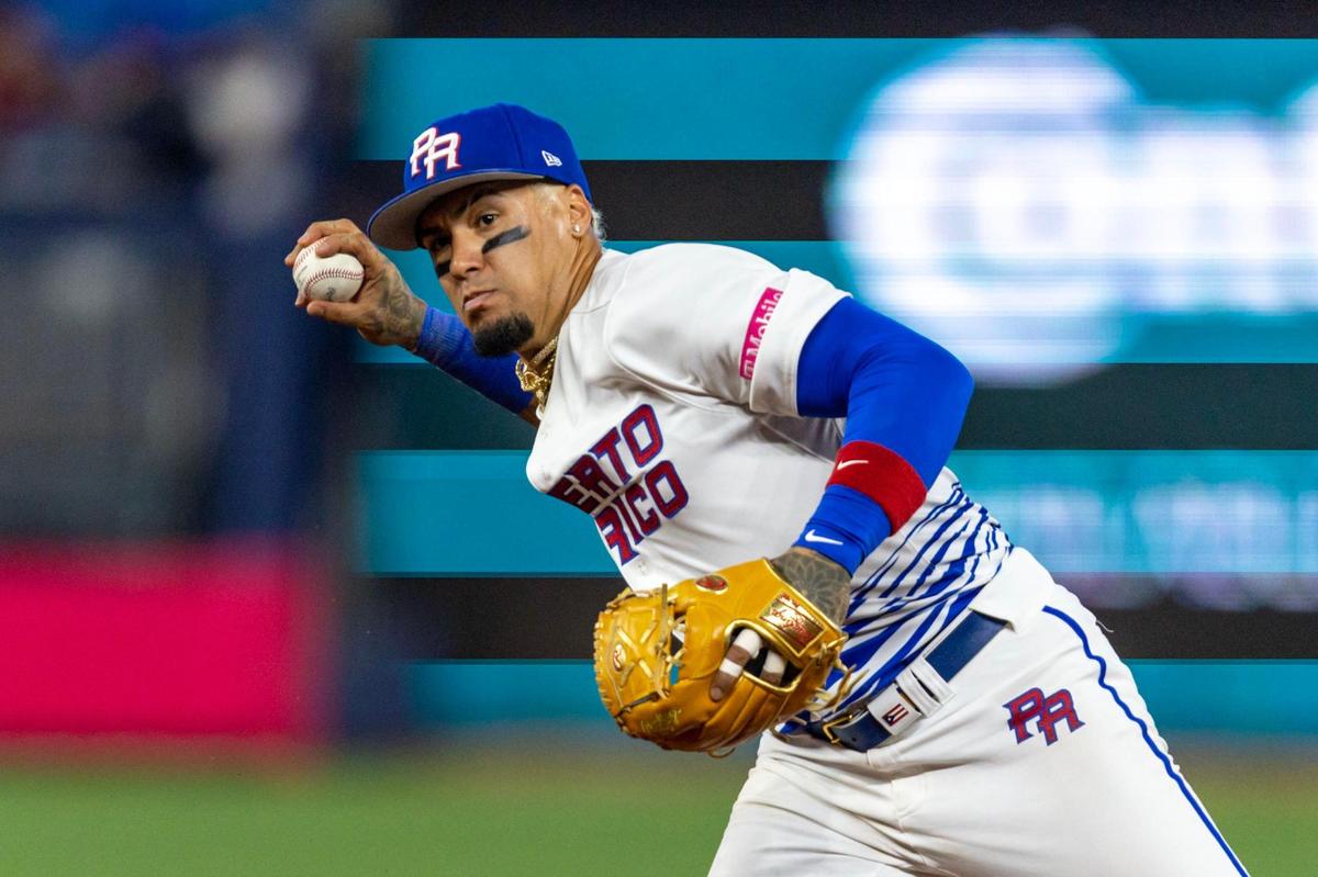 Puerto Rico infielder Javier Báez (9) throws the ball to first base during the fourth inning of a 2023 World Baseball Classic game against Nicaragua at loanDepot Park in Miami, Florida, on Saturday, March 11, 2023.