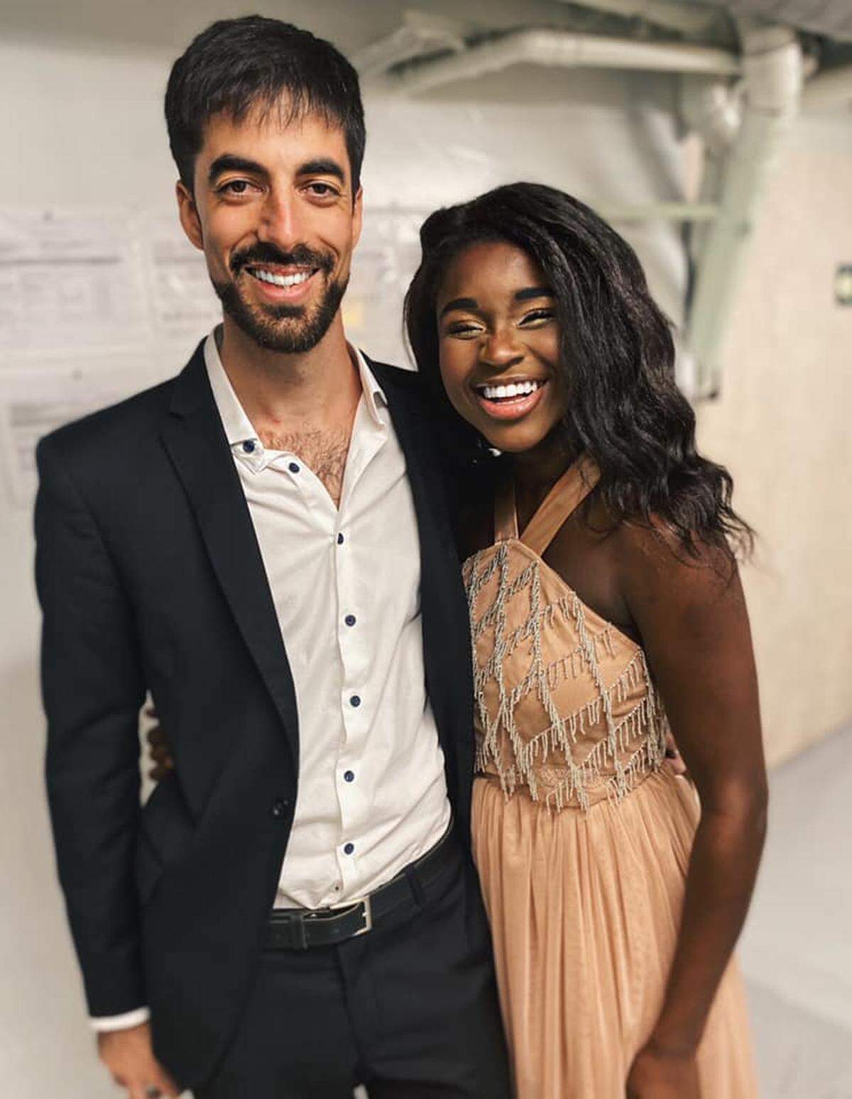 Julia Whitcomb, 24, from Illinois, and Bruno Cruells, 30, from Argentina celebrate Christmas aboard Royal Caribbean Cruises’ Celebrity Infinity ship. They would later spend nearly two months trapped aboard together during the COVID-19 pandemic.