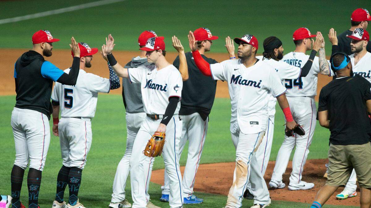 The Miami Marlins celebrate a 2-1 win against the Los Angeles Angels after a Major League Baseball game at loanDepot park on Tuesday, July 5, 2022, in Miami, Florida.