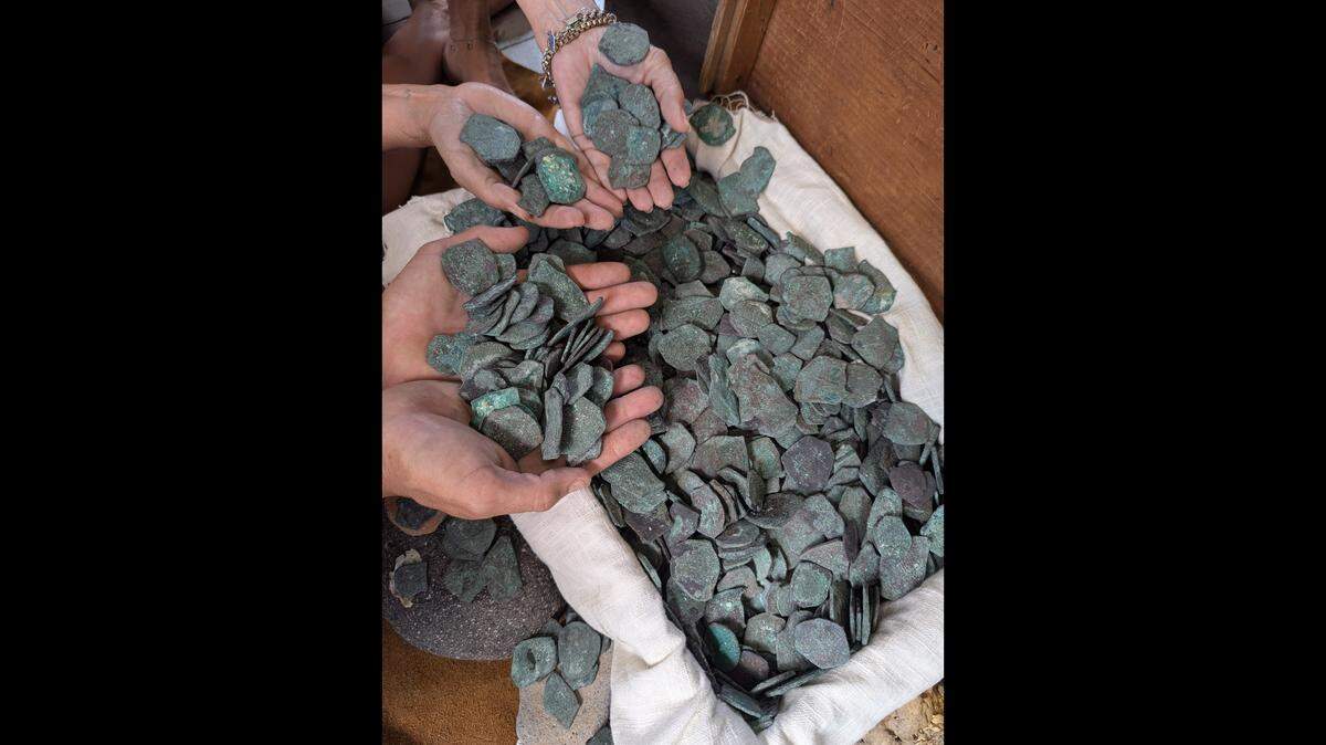The hundreds of silver coins were found over the summer on a shipwreck that is believed to have been part of a lost fleet of up to a dozen Spanish treasure ships known today as the 1715 Fleet, historians say.