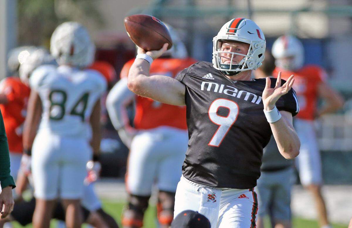 Miami Hurricanes quarterback Tyler Van Dyke (9) sets up to pass during practice at the University of Miamis Greentree Practice Field in Coral Gables on Tuesday, March 22, 2022.