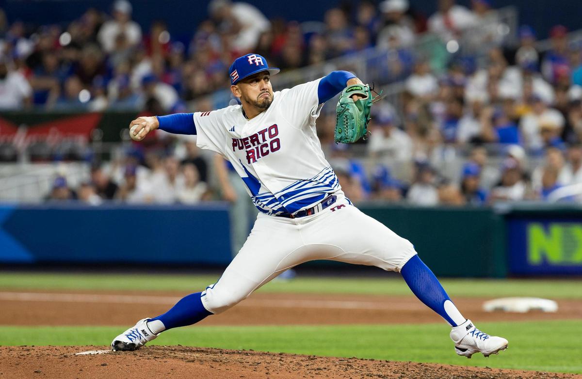 Puerto Rico pitcher José De Leon (87) pitches against Israel during the third inning of a Pool D game at the World Baseball Classic at loanDepot Park on Monday, March 13, 2023, in Miami, Fla.
