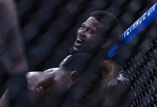 Kevin Holland of the United States reacts as he fights Randy Brown of Jamaica in their welterweight bout at UFC 327 at the Kaseya Center on Saturday, April 11, 2026, in downtown Miami, Fla.
