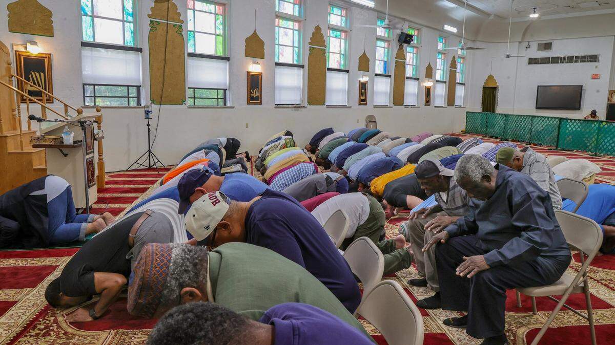 Men pray during the Jumu’Ah prayer service lead by Imam Nasir Ahmad ahead of the Ramadan celebration at Masjid Al-Ansar in 2024. In May, many local Islamic center host “Open Mosque” days for non-Muslims to visit. 