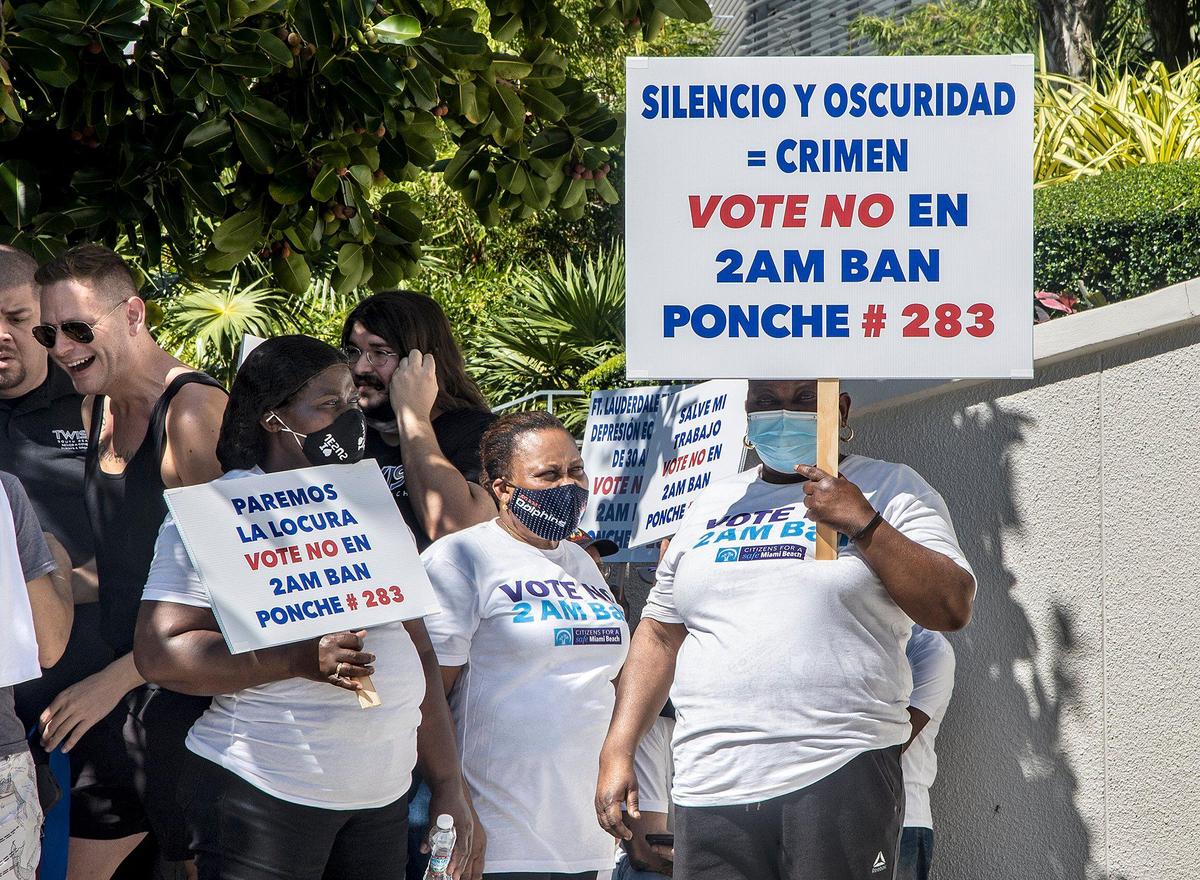 A group of hospitality workers protested outside Miami Beach City Hall against the proposed 2 a.m. rollback of alcohol service across the city as part of a Nov. 2 referendum.