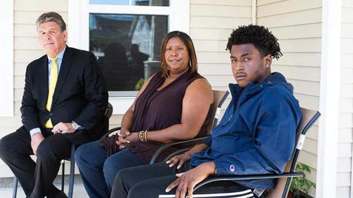 North Carolina teenager Dameon Shepard, shown with his mother, Monica and attorney, Jim Lea, was threatened by a mob of armed whites who came to the wrong house.