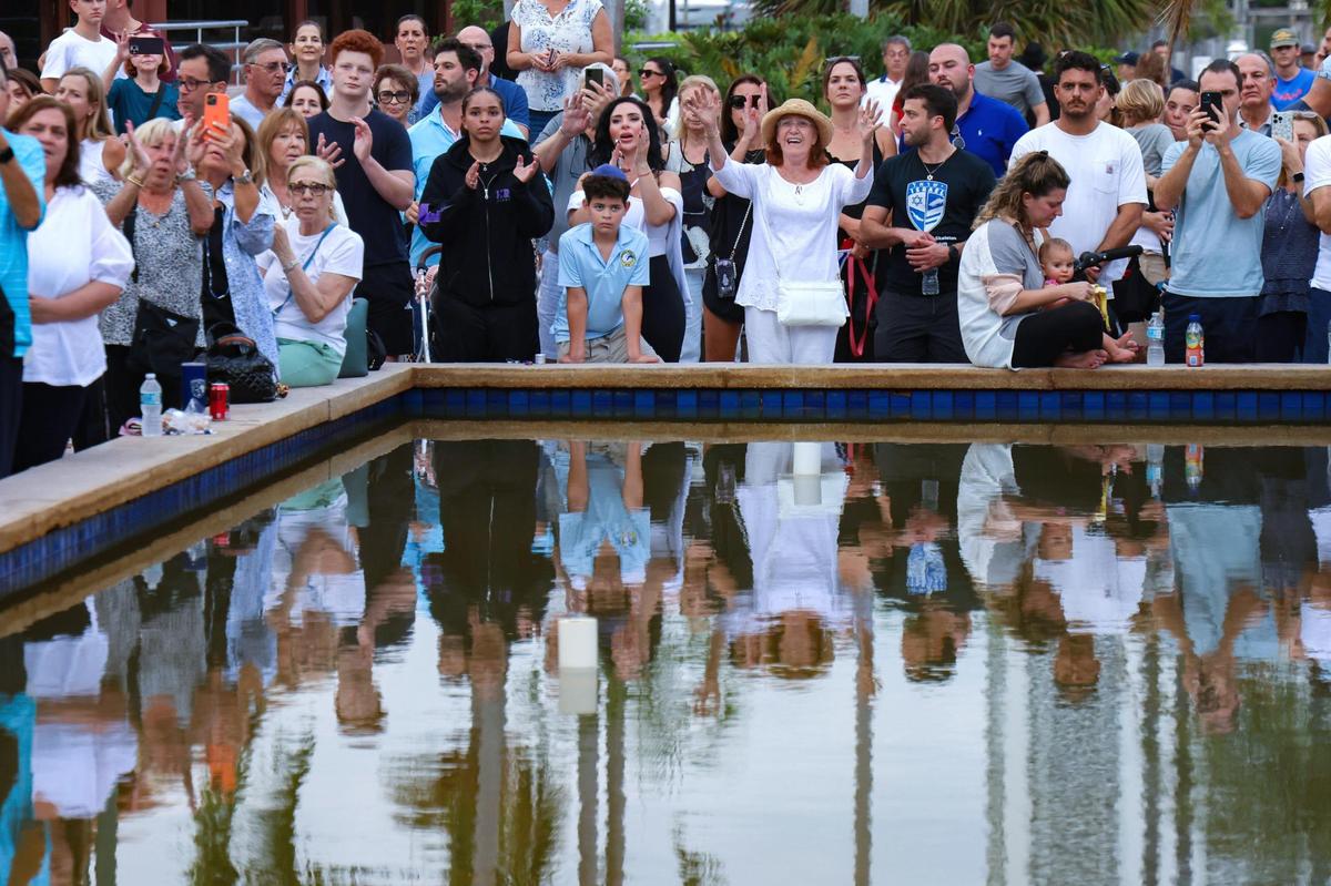 Attendees openly grieved alongside members of the South Florida Jewish community and allies who gathered at the Waterways Shoppes in Aventura to support Israel in its war against Hamas on Monday, Oct. 9, 2023.