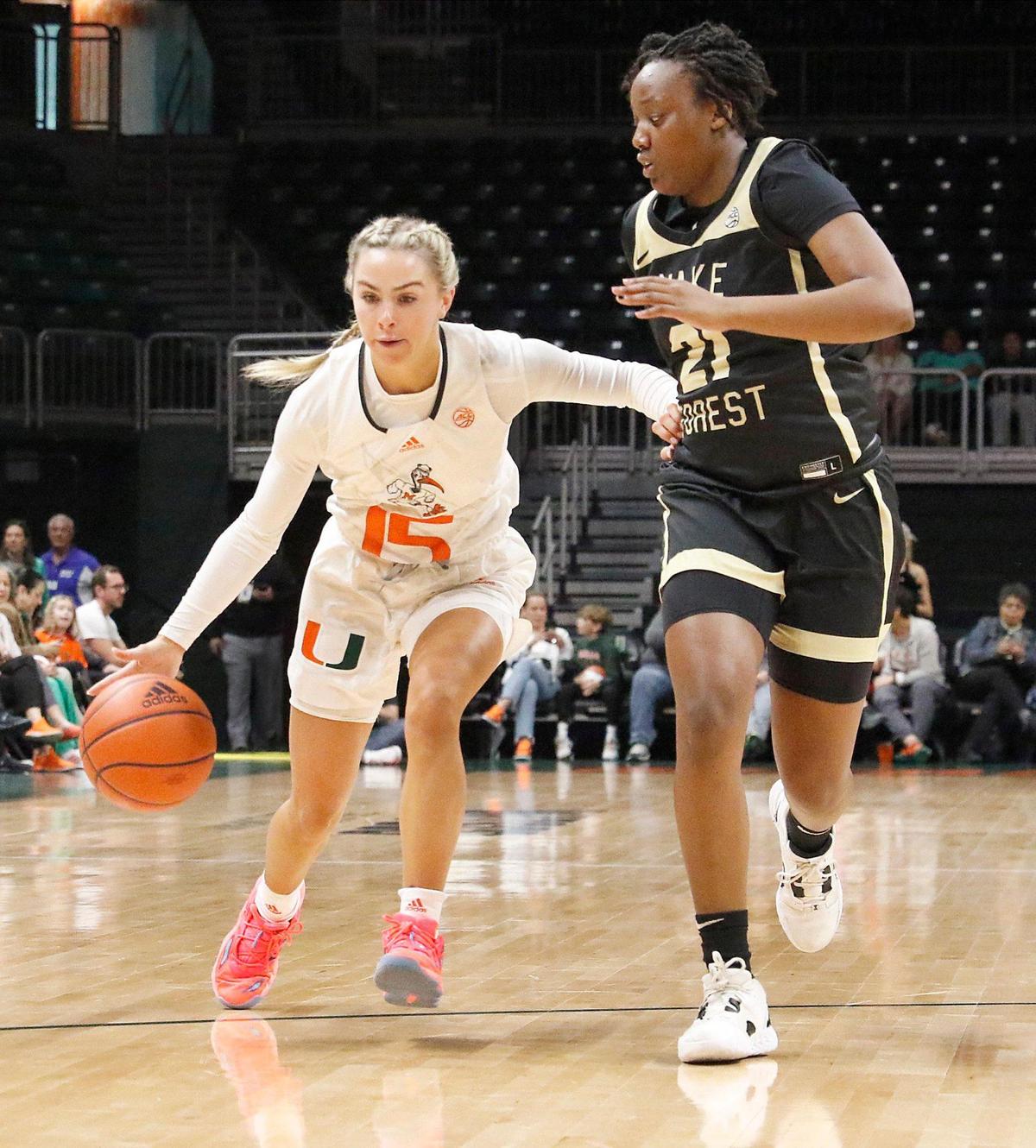 UM Hurricanes Hanna Cavinder (15) controls the ball during NCAA women’s basketball game agains Wake Forest on Sunday, January 15, 2023 at Watsco Center in Coral Gables. Andrew Uloza / for Miami Herald
