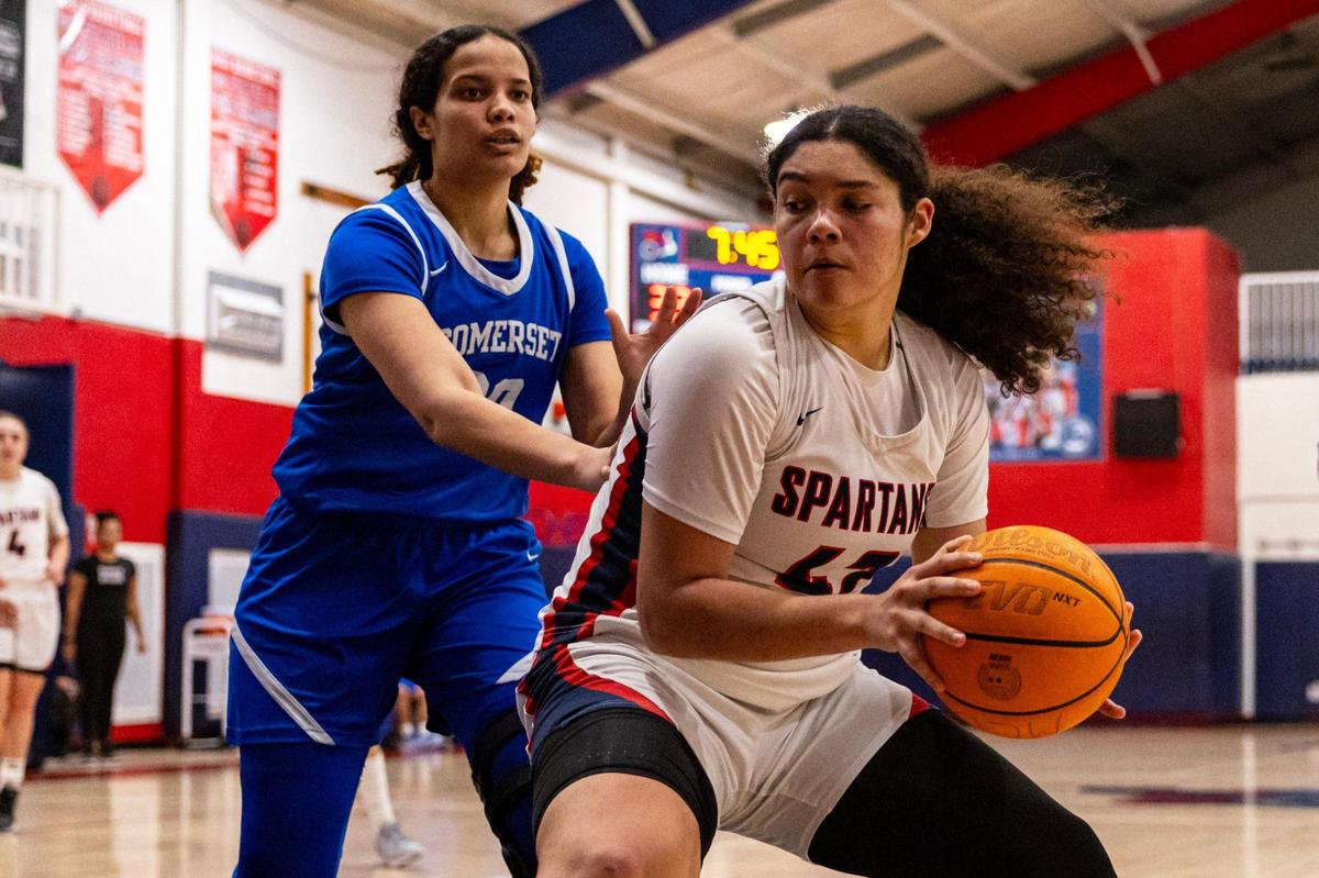 Miami Country Day center Kayla Nems (42) posts up on Somerset forward Brianna Brown (20) during a Regional 4-3A girls basketball final at Miami Country Day School in Miami, Florida on Thursday, February 22, 2024.