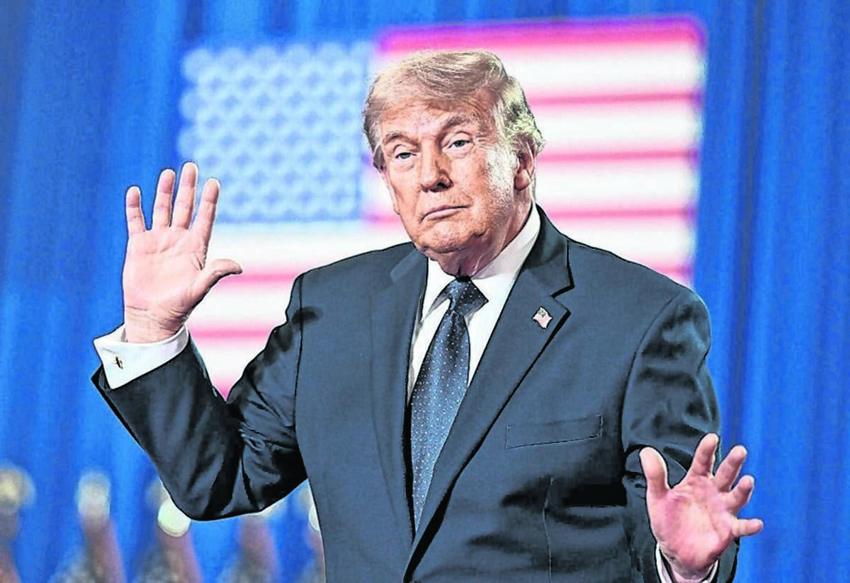 SUFFERN, NEW YORK - MAY 22: U.S. President Donald Trump dances on stage after delivering remarks during a campaign and economic policy event in the Eugene Levy Fieldhouse at SUNY Rockland Community College on May 22, 2026 in Suffern, New York. (Photo by Roberto Schmidt/Getty Images)