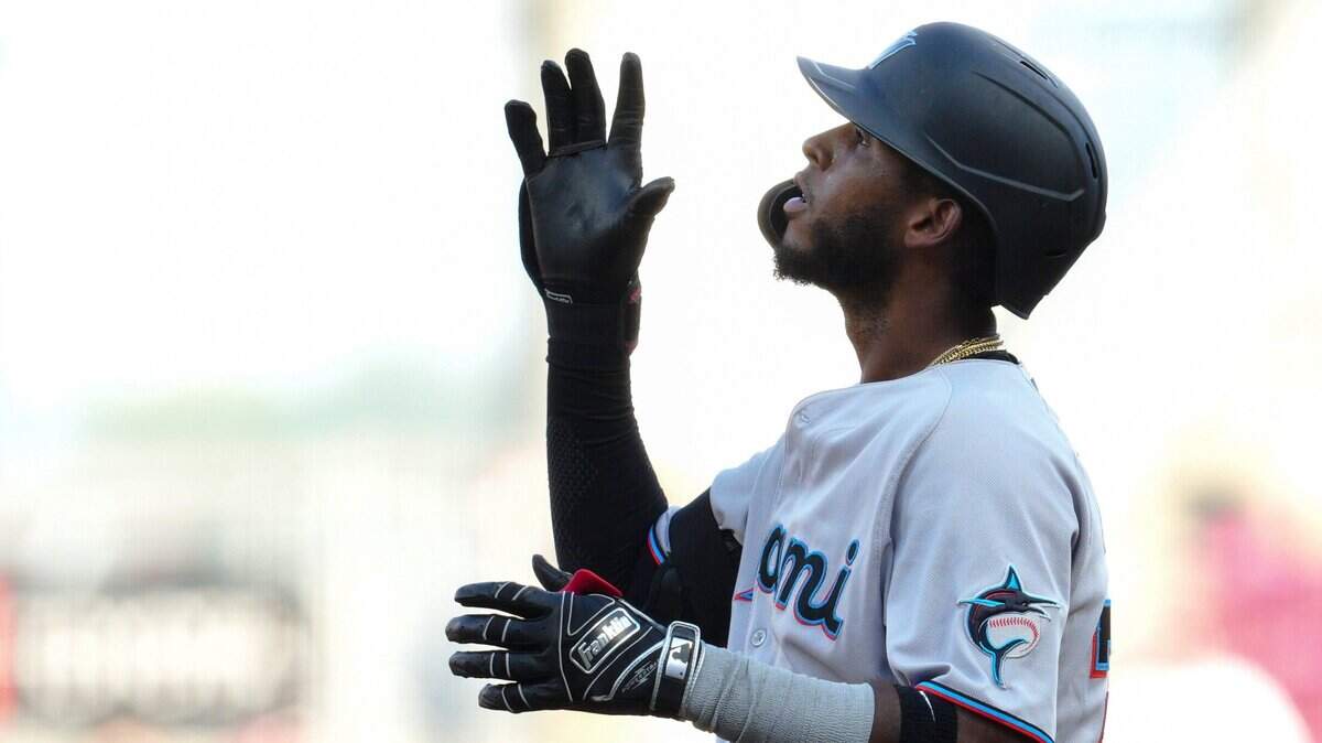 Miami Marlins’ Lewin Diaz reacts after hitting a single during the second inning of the team’s baseball game against the Cincinnati Reds on Wednesday, July 27, 2022, in Cincinnati. (AP Photo/Jeff Dean)