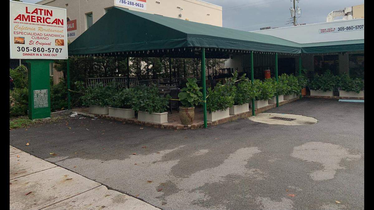 Yellow tape bordered the patio seating area Monday afternoon as Maimi’s Latin American Restaurant, 1590 Coral Way, remained closed after a disgusting inspection.