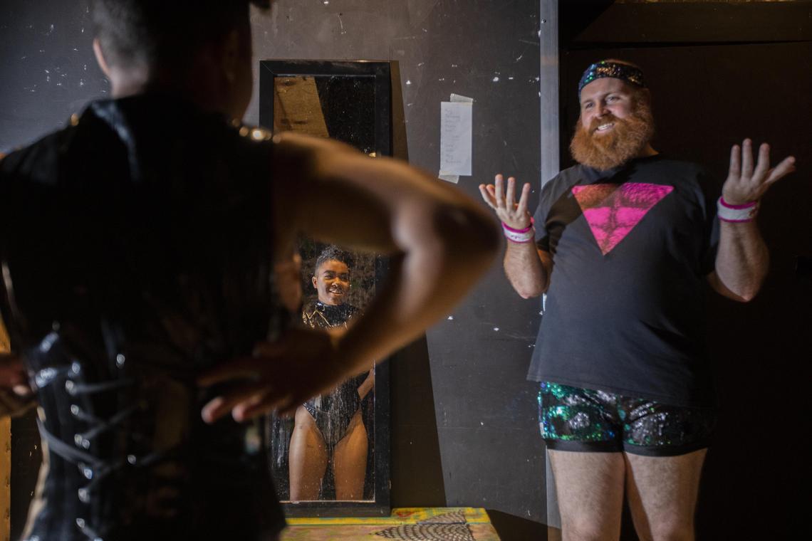 King Femme., left, and DJ Hottpants (Daniel Blair) prep for the show at Gramps in Wynwood earlier this month.