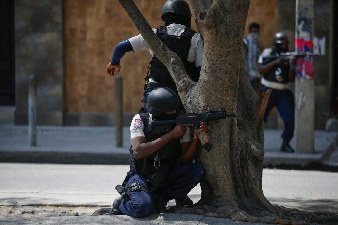 Police officers carry out an anti-gang operation in the Lalue neighborhood of Port-au-Prince, Haiti, Friday, March 3, 2023.