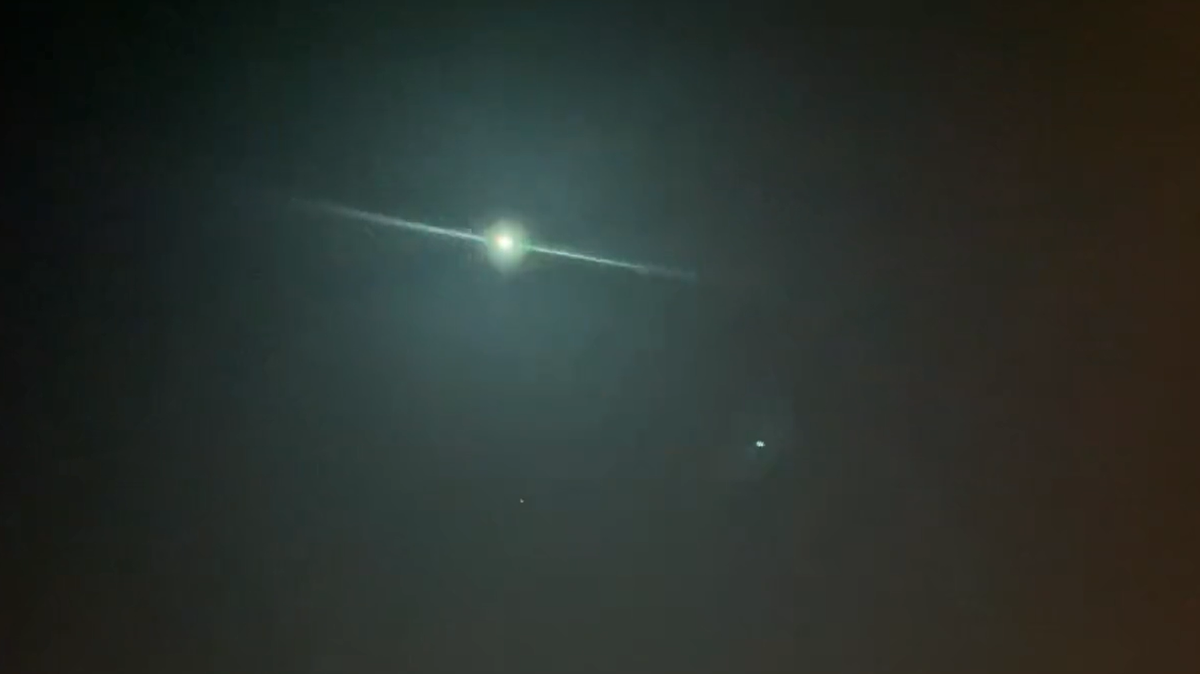 A small asteroid, 2023 CX1 or Sar2667, illuminated the night sky near the English Channel. Videos show the fiery green and orange meteor.