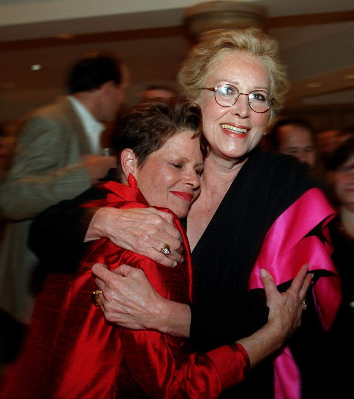 In this file photo from Dec. 3, 1996, for a Miami Herald feature on the Hippest People list in Miami, Susan Brustman is pictured with photographer Iran Issa-Khan.