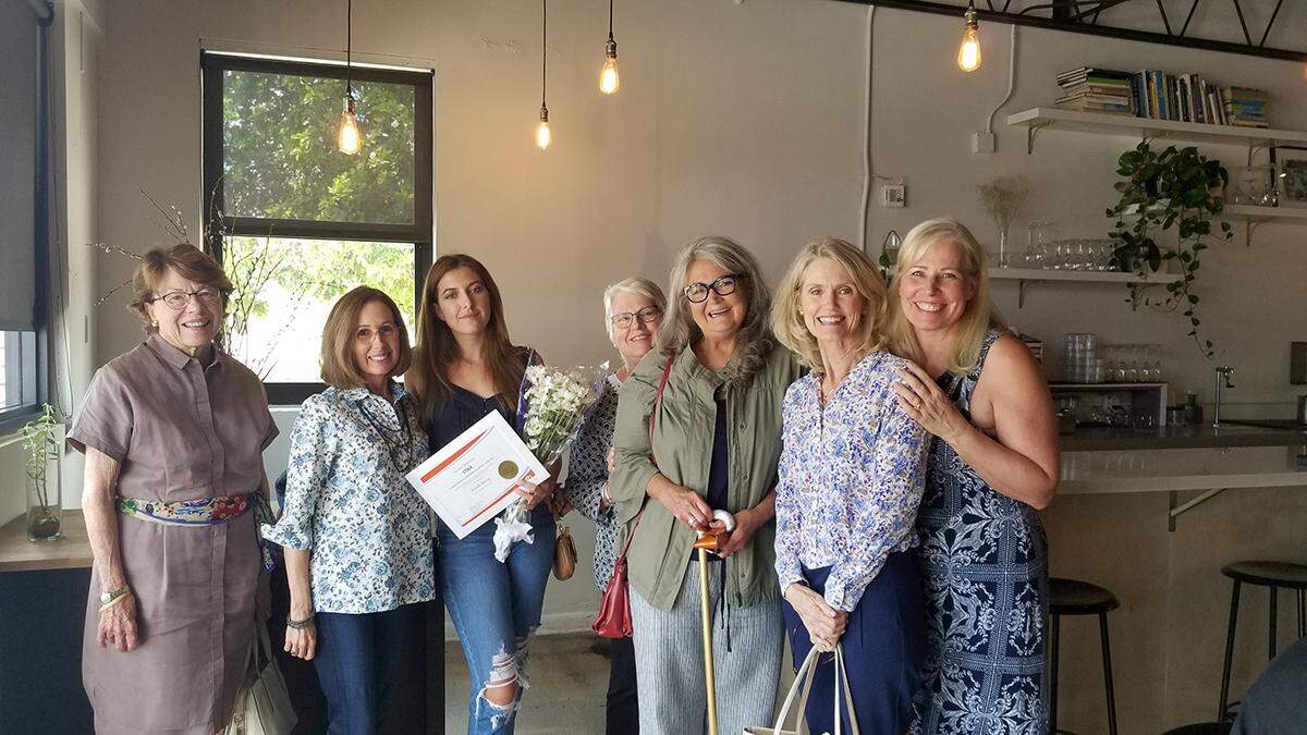 Isabella Gomez, center, of Palmer Trinity School recently received the $2,500 Star Scholarship from the Philanthropic Educational Organization (PEO) Sisterhood. She is pictured above with members of the PEO Sisterhood Chapter AK in Miami. 